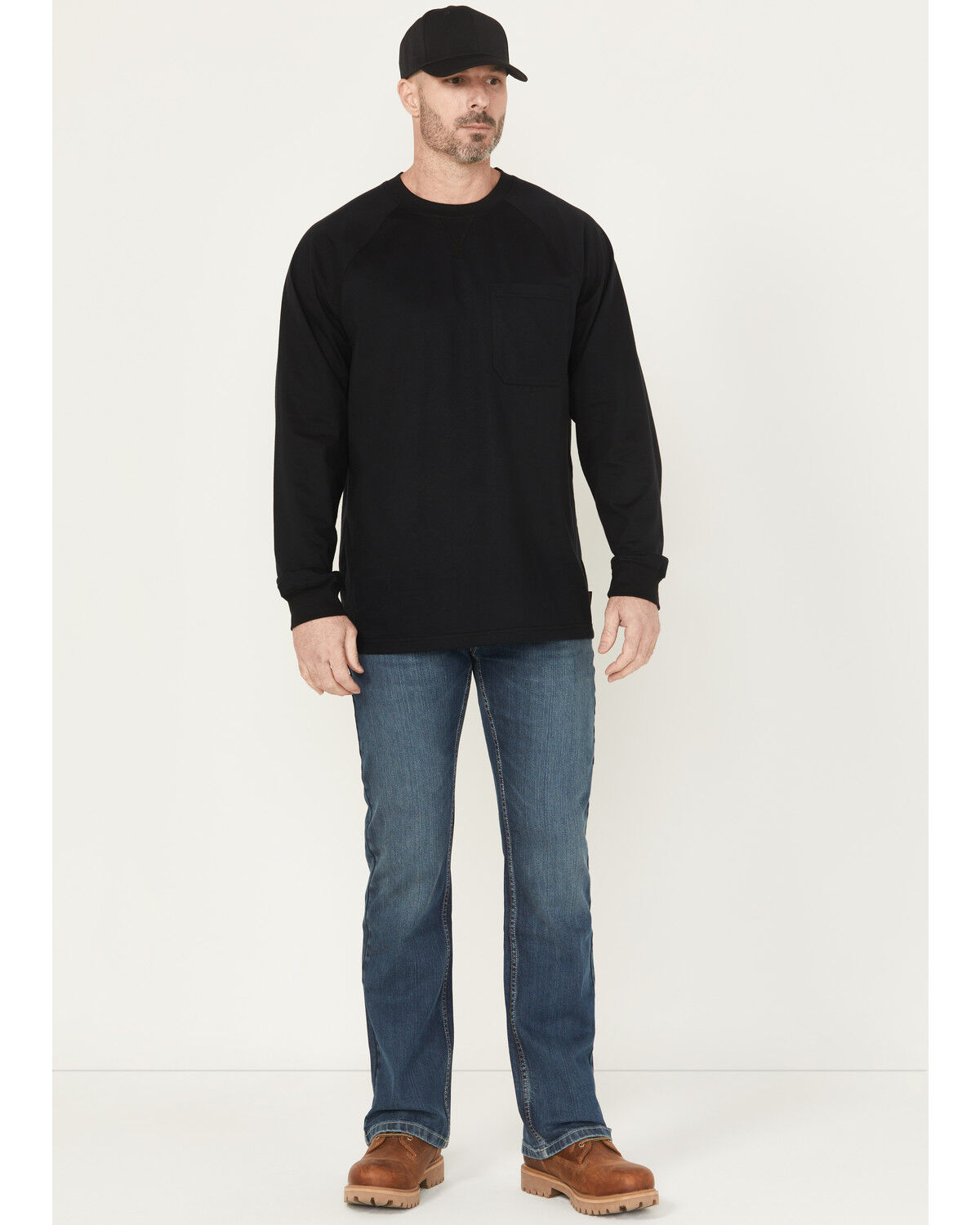 Image #1 - Cody James Men's FR Medium Wash Bozeman Slim Bootcut Stretch Denim Work Jeans, Medium Wash, hi-res
