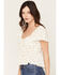 Image #2 - Cleo + Wolf Women's Floral Print Flutter Sleeve Ruffle Peplum Top, Ivory, hi-res